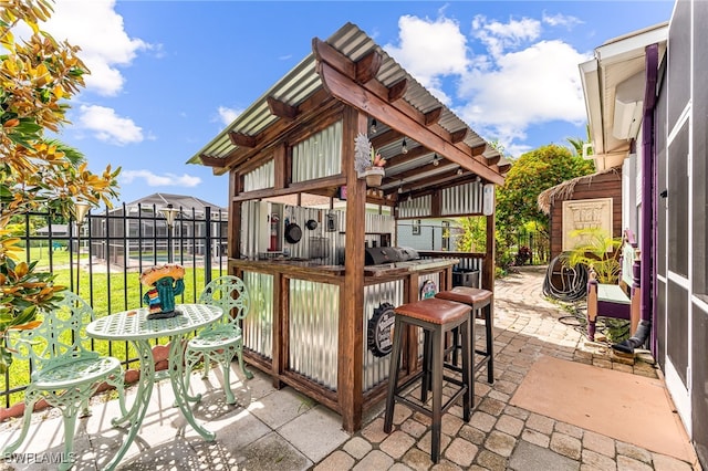 view of patio / terrace featuring a bar