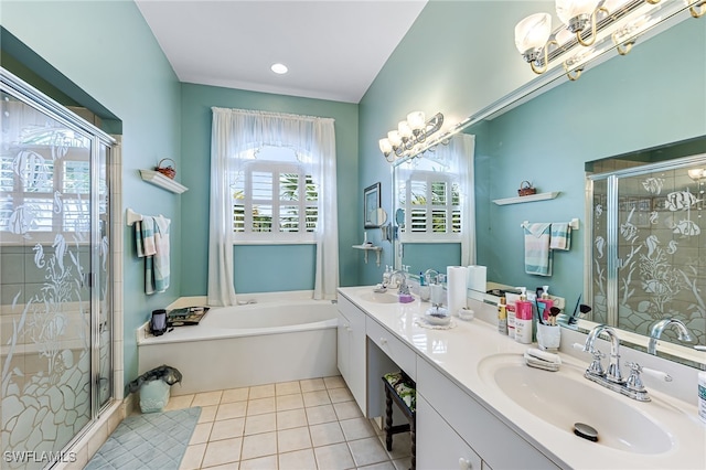 bathroom featuring vanity, tile patterned floors, and plus walk in shower