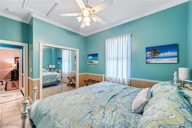 tiled bedroom featuring ornamental molding and ceiling fan