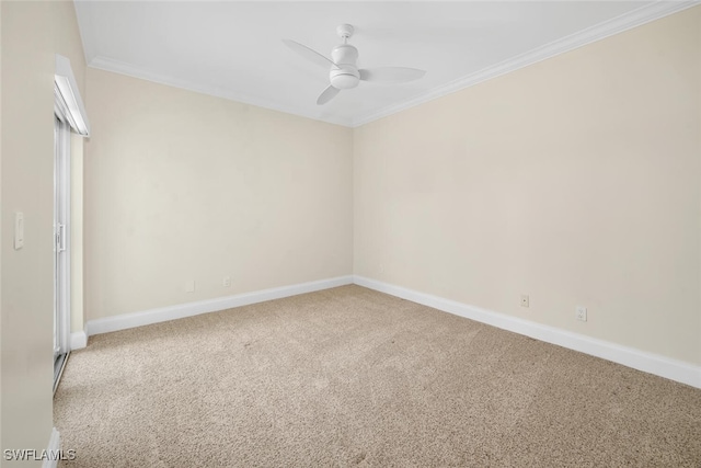 unfurnished room with ceiling fan, crown molding, and carpet floors