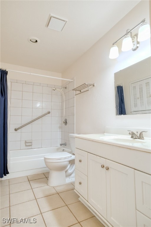 full bathroom with shower / tub combo, vanity, tile patterned floors, and toilet