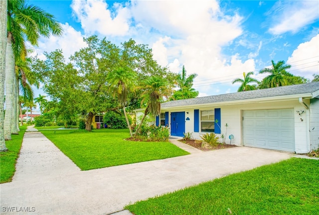 single story home with a front yard and a garage