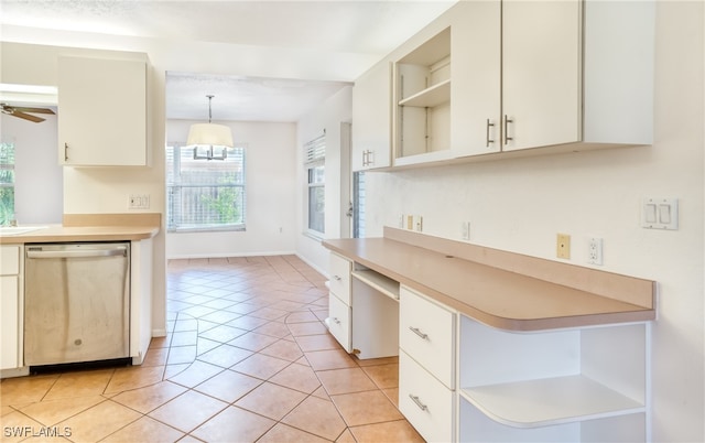 kitchen with ceiling fan, hanging light fixtures, stainless steel dishwasher, and light tile patterned floors