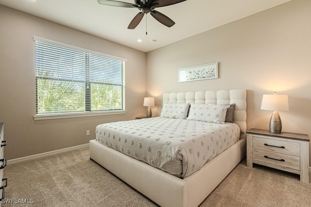 bedroom with baseboards, light carpet, a ceiling fan, and recessed lighting