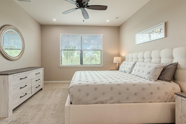 bedroom featuring baseboards, recessed lighting, ceiling fan, and light carpet