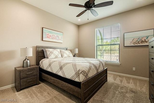 bedroom with recessed lighting, baseboards, light colored carpet, and ceiling fan