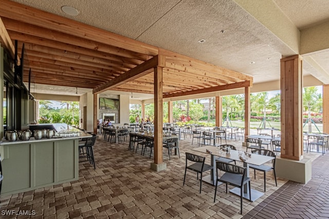 view of patio featuring an outdoor bar