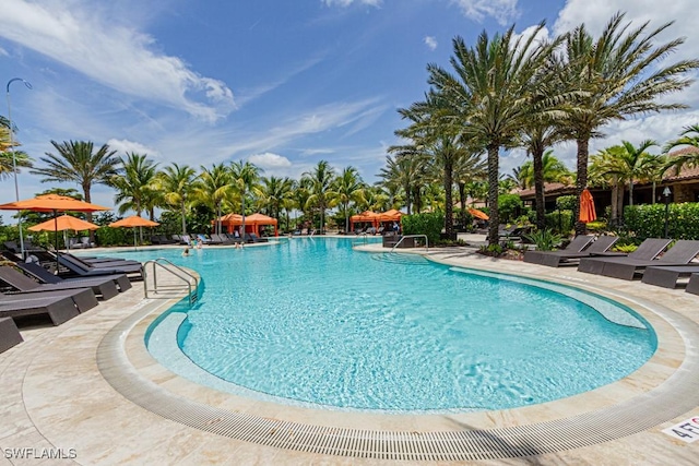 pool with a patio area
