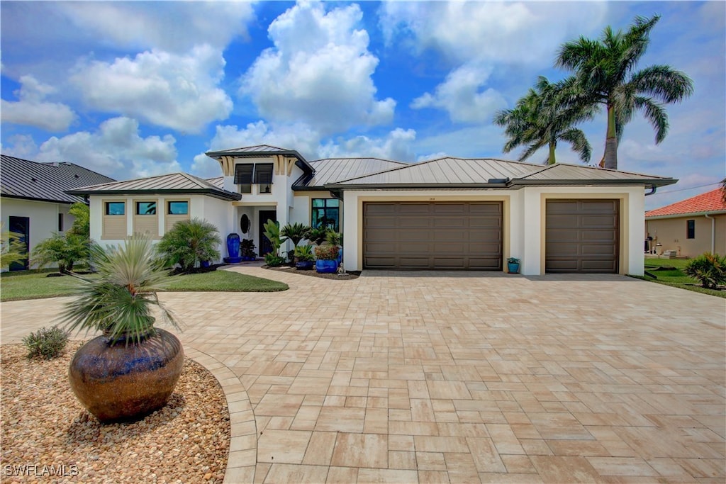 view of front of property with a garage