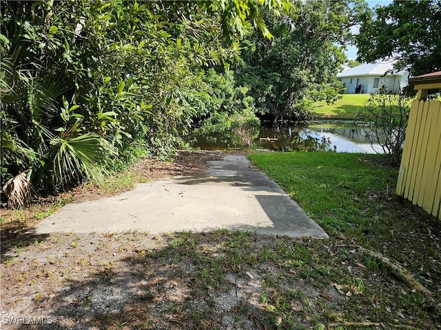 view of yard with a water view