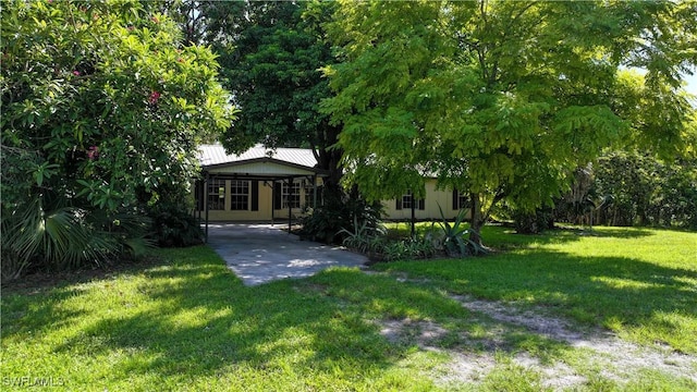 view of yard with a carport