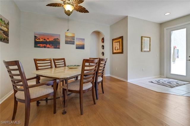 dining room featuring light wood-type flooring and ceiling fan