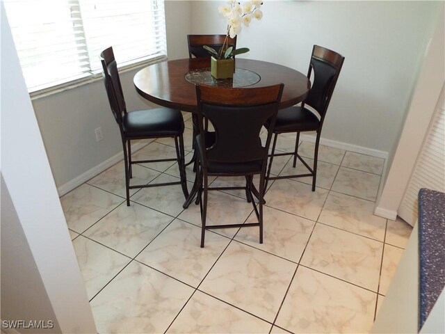 view of tiled dining room