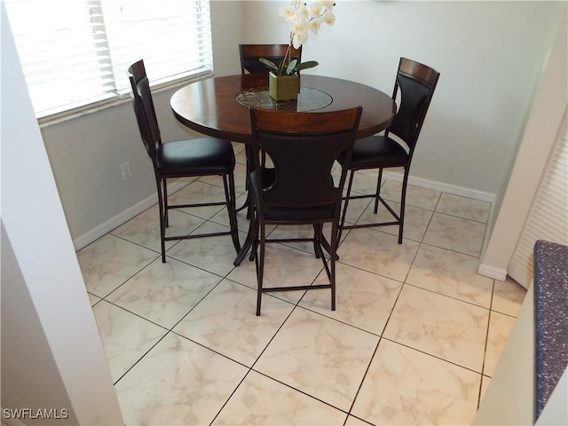 view of tiled dining area