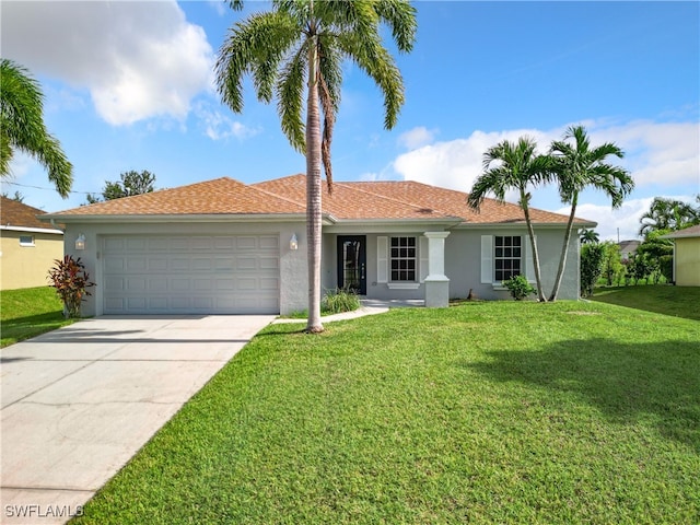 ranch-style home with a garage and a front yard