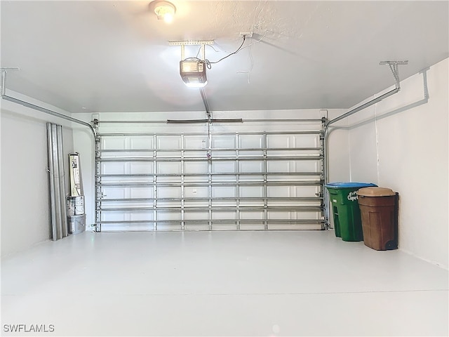 garage featuring a garage door opener