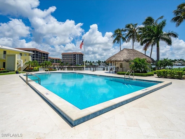 view of swimming pool with a patio area