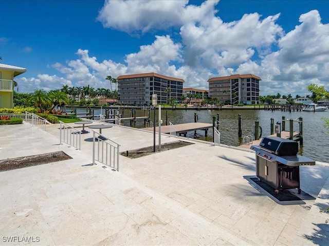 dock area featuring a water view