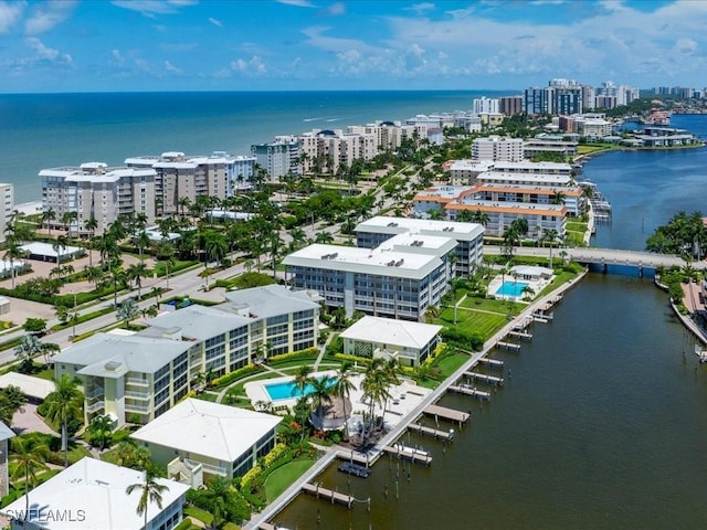 birds eye view of property featuring a water view