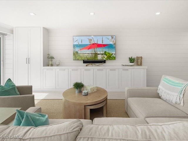 living room featuring light colored carpet