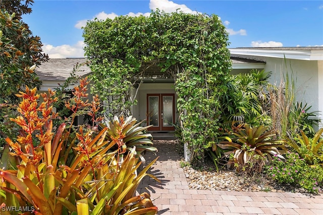 view of exterior entry with french doors