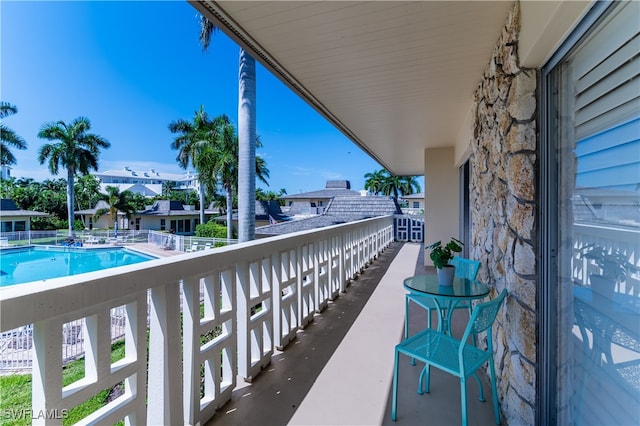 balcony with a community pool