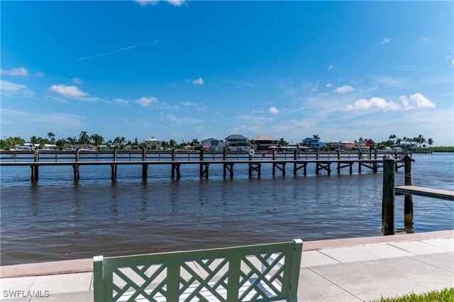 dock area featuring a water view