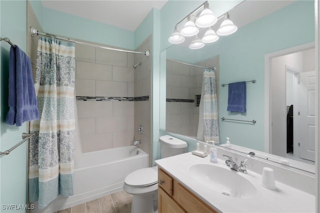 full bathroom featuring hardwood / wood-style floors, toilet, shower / bathtub combination with curtain, and vanity