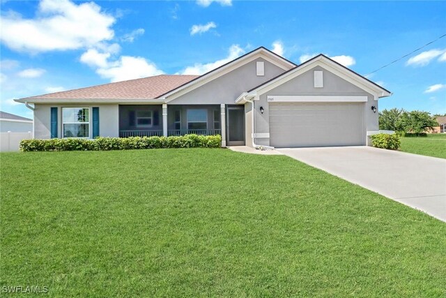 ranch-style home featuring a garage and a front lawn