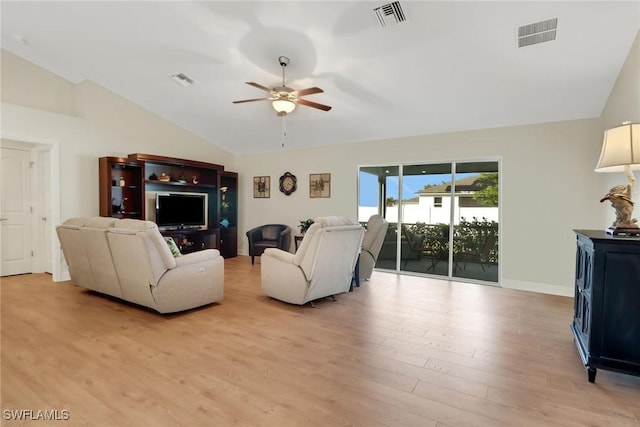 living room with vaulted ceiling, ceiling fan, and light hardwood / wood-style flooring