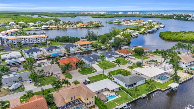 bird's eye view with a water view