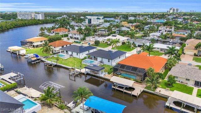 birds eye view of property featuring a water view