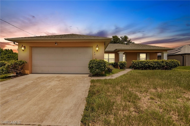 view of front of property featuring a garage