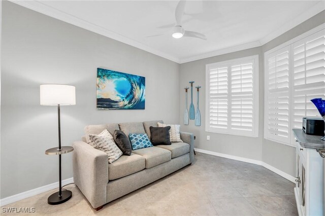 living area featuring ceiling fan, baseboards, crown molding, and light tile patterned flooring