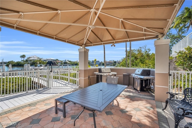 view of patio / terrace featuring area for grilling and a gazebo