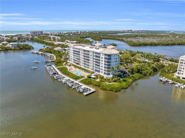 birds eye view of property featuring a water view