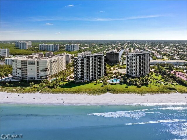 aerial view with a view of city, a water view, and a beach view