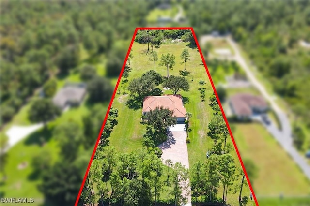 birds eye view of property featuring a rural view