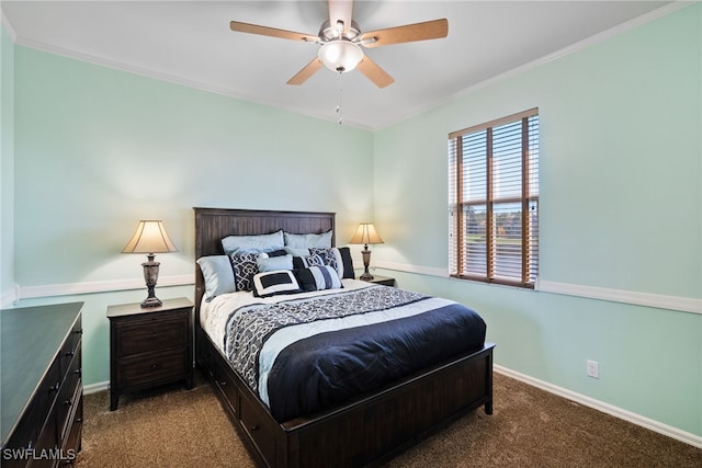 carpeted bedroom featuring crown molding, a ceiling fan, and baseboards