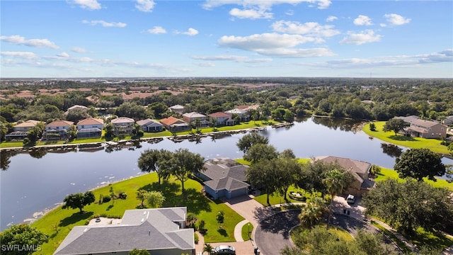 bird's eye view featuring a water view and a residential view