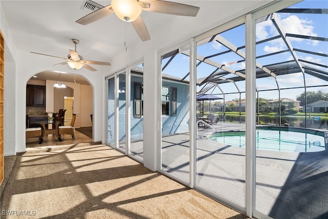 view of pool featuring a water view