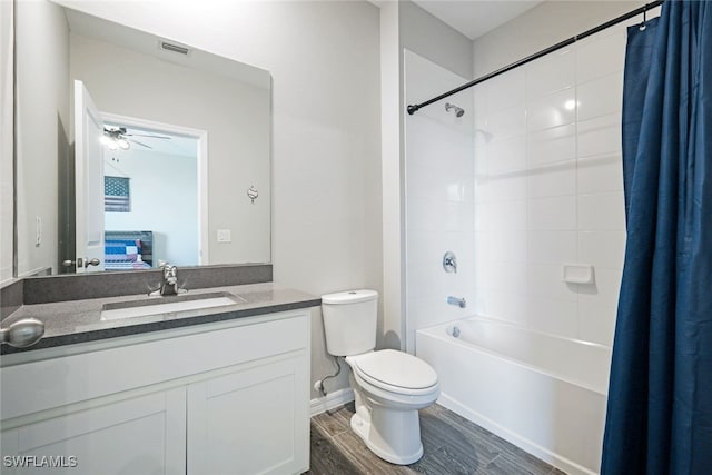 ensuite bathroom with visible vents, toilet, connected bathroom, vanity, and wood finished floors