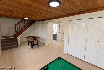rec room with wood ceiling