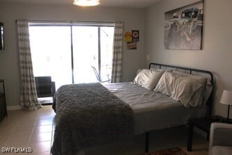 tiled bedroom with baseboards