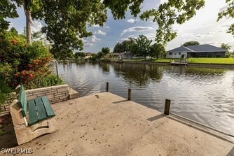 view of dock featuring a water view