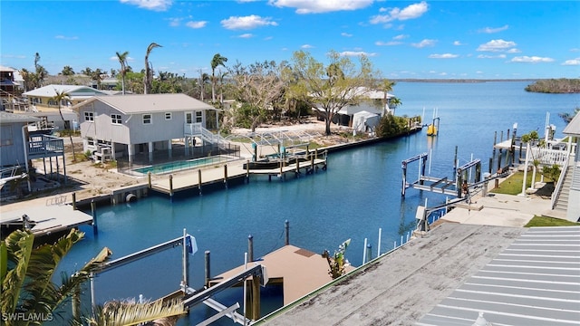 view of dock featuring a pool and a water view