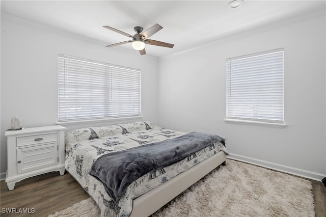 bedroom with crown molding, ceiling fan, and wood-type flooring