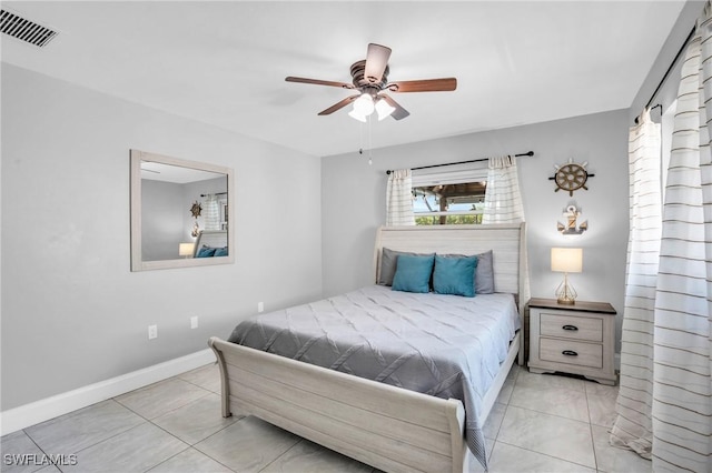 bedroom with light tile patterned floors and ceiling fan