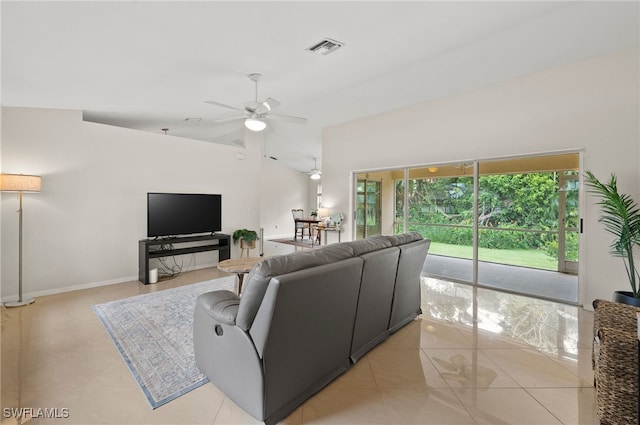 living room with light tile patterned flooring and ceiling fan