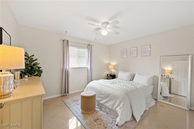 bedroom featuring ceiling fan and light tile patterned flooring